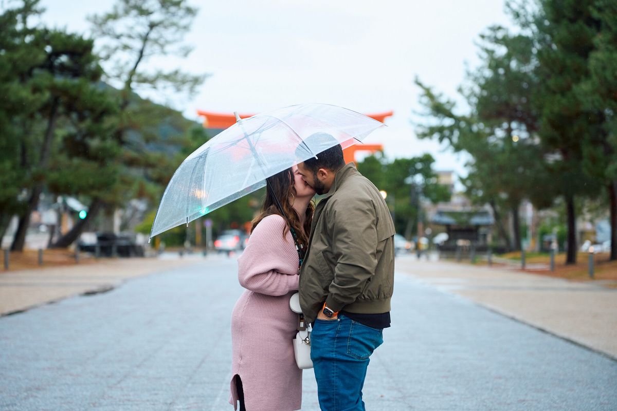 Kissing under the umbrella