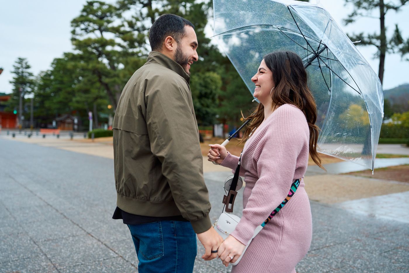 Laughing under the umbrella